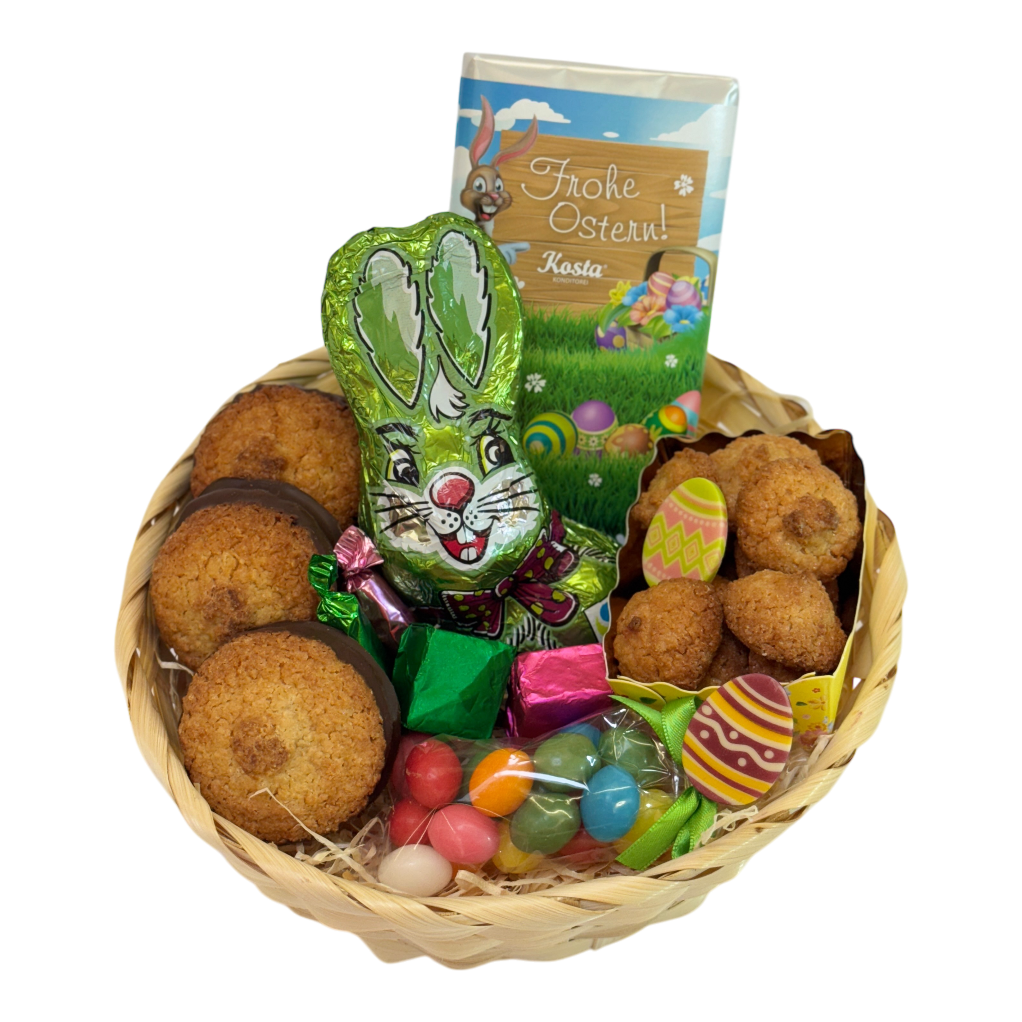 Kunterbunte Ostern Korb mit Schoko-Hasen, Dragées, Pralinen und Ostergebäck