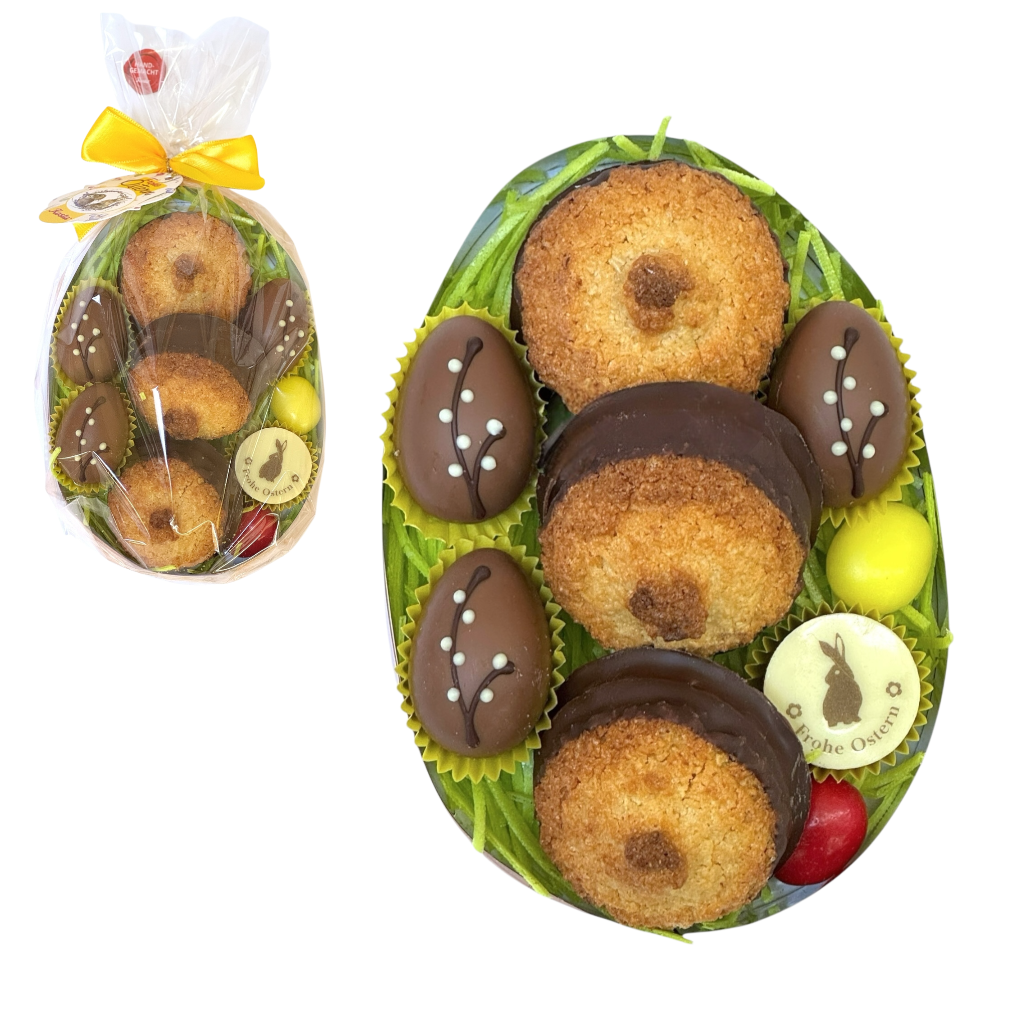 Ovales Osterpräsent mit Kokoskuppeln, Pralinen, Ostergras und bunter Schleife